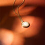 White Solis Aqua Blue Glowing Pendant Necklace With Uv Keyring Torch, thumbnail 1 of 10
