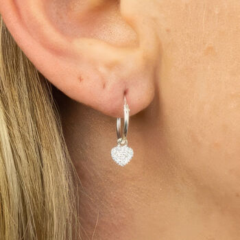 Sterling Silver Huggie Hoop Earrings With Twinkling Heart Charms, 3 of 8