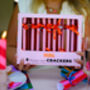 Colourful Pink And Maroon Stripe Christmas Crackers, thumbnail 1 of 7