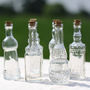 Set Of Six Glass Bottle Vases With Cork Stoppers, thumbnail 6 of 8