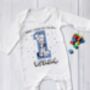 Personalised Boys First Birthday Eve Babygrow, thumbnail 1 of 5