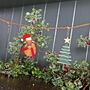 Highland Cow Coo And Christmas Tree Garland, thumbnail 1 of 4