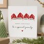 Personalised Family Christmas Card With Santa Hats, thumbnail 1 of 7