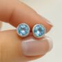 Sterling Silver Blue Topaz Stud Earrings, thumbnail 1 of 10