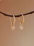 Round Gold Rutilated Quartz Twisted Hoop Earrings, thumbnail 1 of 10