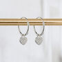 Sterling Silver Huggie Hoop Earrings With Twinkling Heart Charms, thumbnail 1 of 8