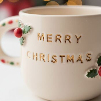 Handmade Merry Christmas Ceramic Mug With Holly Detailing And Festive Handle, 3 of 3