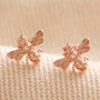 Tiny Bee Stud Earrings In Rose Gold Plating, thumbnail 1 of 6