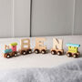 Engraved New Baby Wooden Name Train Set, thumbnail 5 of 12