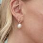 Sterling Silver Circle With Dangling Baroque Pearl Drop Stud Earrings, thumbnail 7 of 12