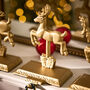 Santa's Sleigh Set Of Four Stocking Holders, thumbnail 6 of 6