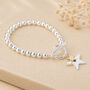 Sterling Silver And Gold Plated Bead Bracelet With Star Charms, thumbnail 1 of 6
