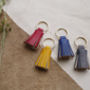 Leather Tassel Keyring With Pressed Personalisation, thumbnail 4 of 7