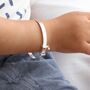 Sterling Silver 'Twinkle Star' Christening Bangle, thumbnail 2 of 3