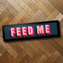 'Feed Me' Pink And Blue Funny Framed Landscape Print, thumbnail 1 of 6