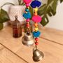 String Of Rainbow Pom Pom's With Brass Bell, thumbnail 2 of 5