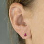 Sterling Silver Teardrop Ruby Mini Stud Earrings, thumbnail 2 of 5