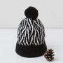Lambswool Knitted Zebra Pom Pom Hat, thumbnail 2 of 12