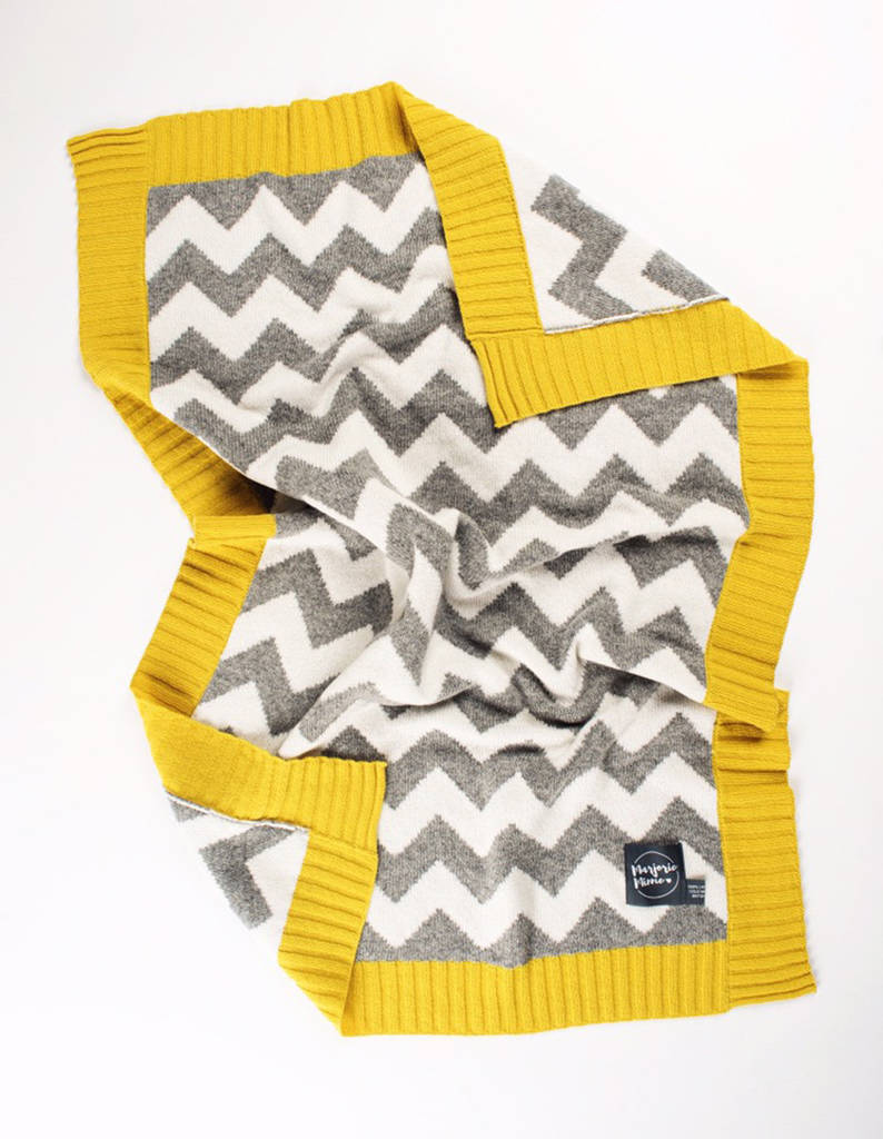 grey and yellow baby blanket