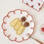 Scalloped Red And White Ceramic Plate, thumbnail 1 of 4