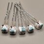 Set Of Five Ceramic Floral Wedding Hair Pins, thumbnail 1 of 12
