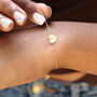 Personalised Nine Ct Gold Initial Heart Bracelet, thumbnail 2 of 4