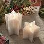 Two White Wax Star Shaped Tru Glow® LED Battery Candles, thumbnail 1 of 4