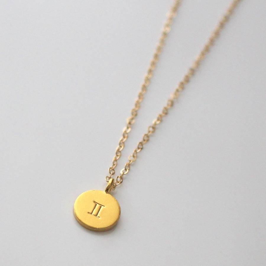 gold zodiac star sign necklace by a box for my treasure