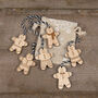 Mini Wooden Gingerbread Men Decorations, thumbnail 1 of 2