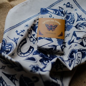 Traditional Tattoo Navy Blue Screen Printed Tea Towel, 4 of 7