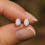 Sterling Silver White Opal Claw Stud Earrings, thumbnail 1 of 4