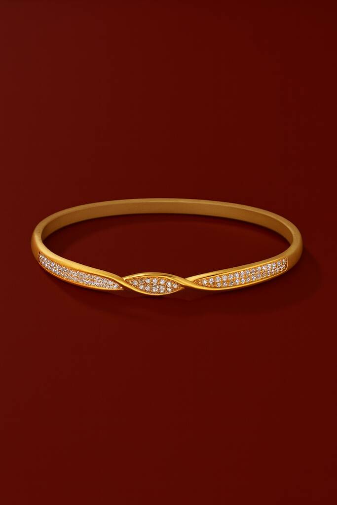 Gold Plated Twisted Bangle With Cubic Zirconia Sparkle