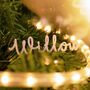 Personalised Cut Out Name Christmas Decoration, thumbnail 1 of 5