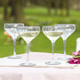 Set Of Four Ribbed Glass Champagne Saucers, thumbnail 1 of 9