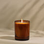 Handmade Sandalwood Amber Glass Candle, thumbnail 4 of 4