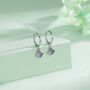 Sterling Silver Tiny Purple Cz Dangle Huggie Hoop Earrings, thumbnail 1 of 12