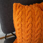 Hand Knit Plaited Cable Knit Cushion In Apricot, thumbnail 2 of 3
