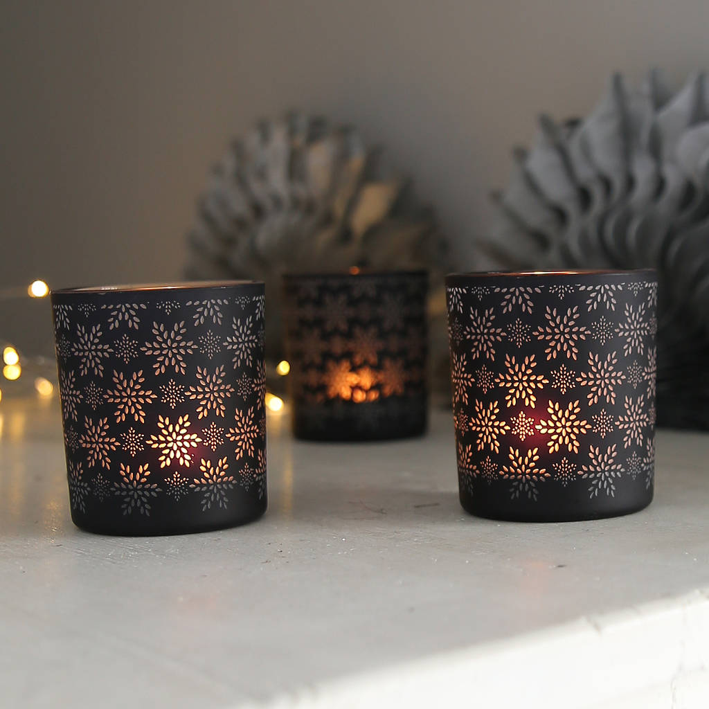 black snowflake tea light holder by red lilly