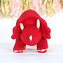 Red Knitted Triceratops Dinosaur Soft Toy, thumbnail 2 of 4