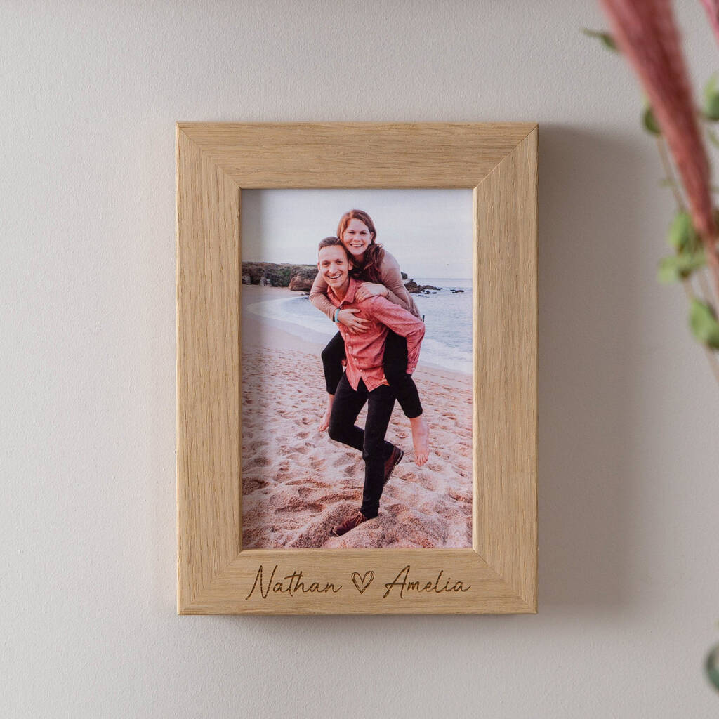 Couple's Love Heart Engraved Oak Photo Frame By No Ordinary Gift