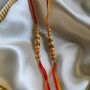 Golden Yellow Threaded Beaded Rakhi For Brother, thumbnail 4 of 6