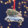 Morris Minor With Christmas Tree Decoration, thumbnail 1 of 4