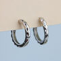 Sterling Silver Geometric Surface Huggie Hoop Earrings, thumbnail 1 of 7