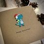 Personalised Dinosaur Pom Pom Happy Christmas Card, thumbnail 2 of 2