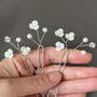 White Floral Bridal Hair Pins Set Of Three, thumbnail 2 of 12