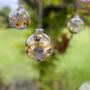 Set Of Three Pressed Flower And Gold Leaf Baubles, thumbnail 1 of 3