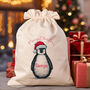 Personalised Cotton Penguin Christmas Gift Bag, thumbnail 1 of 2