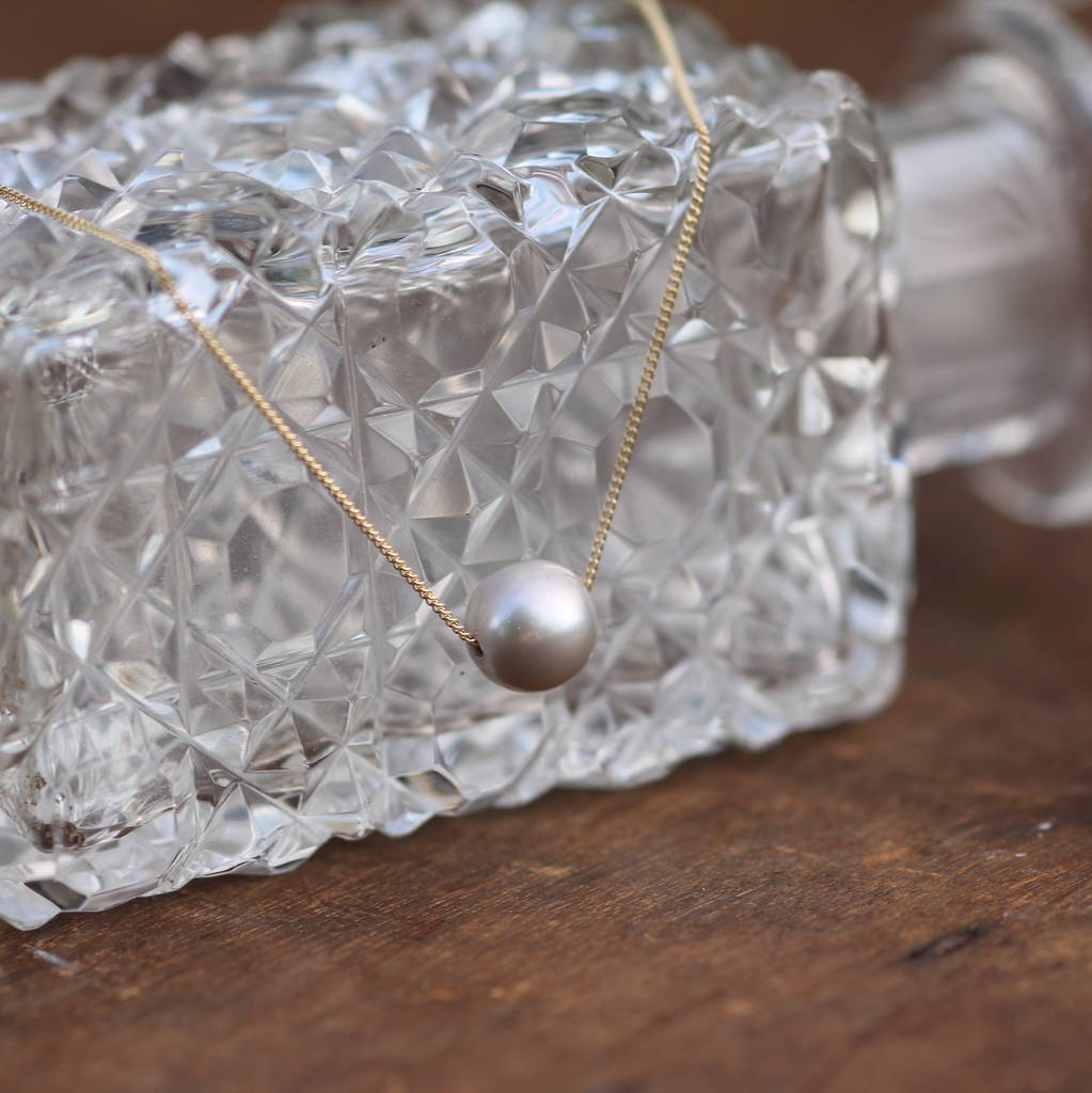 gold floating pearl necklace by joulberry