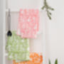 'Punchy Paprika' Tea Towel, In Pink, Green Or Orange, thumbnail 1 of 4