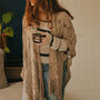 Cream Knitted Butterfly Back Kimono With Tassels, thumbnail 1 of 3